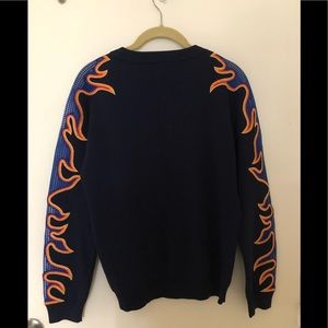 Navy blue sweater with flame details